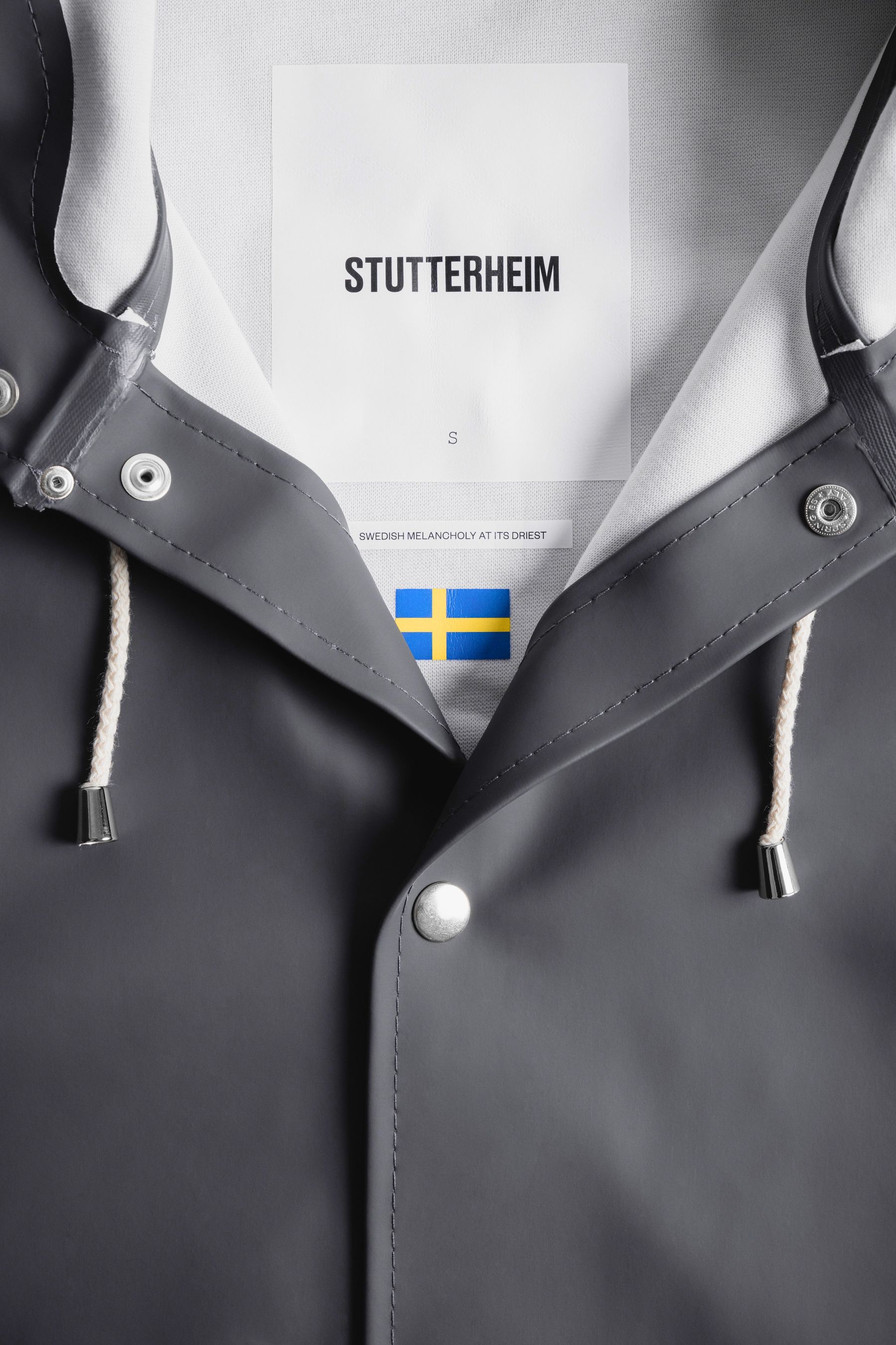 stutterheim stockholm raincoat charcoal women jackets raincoats