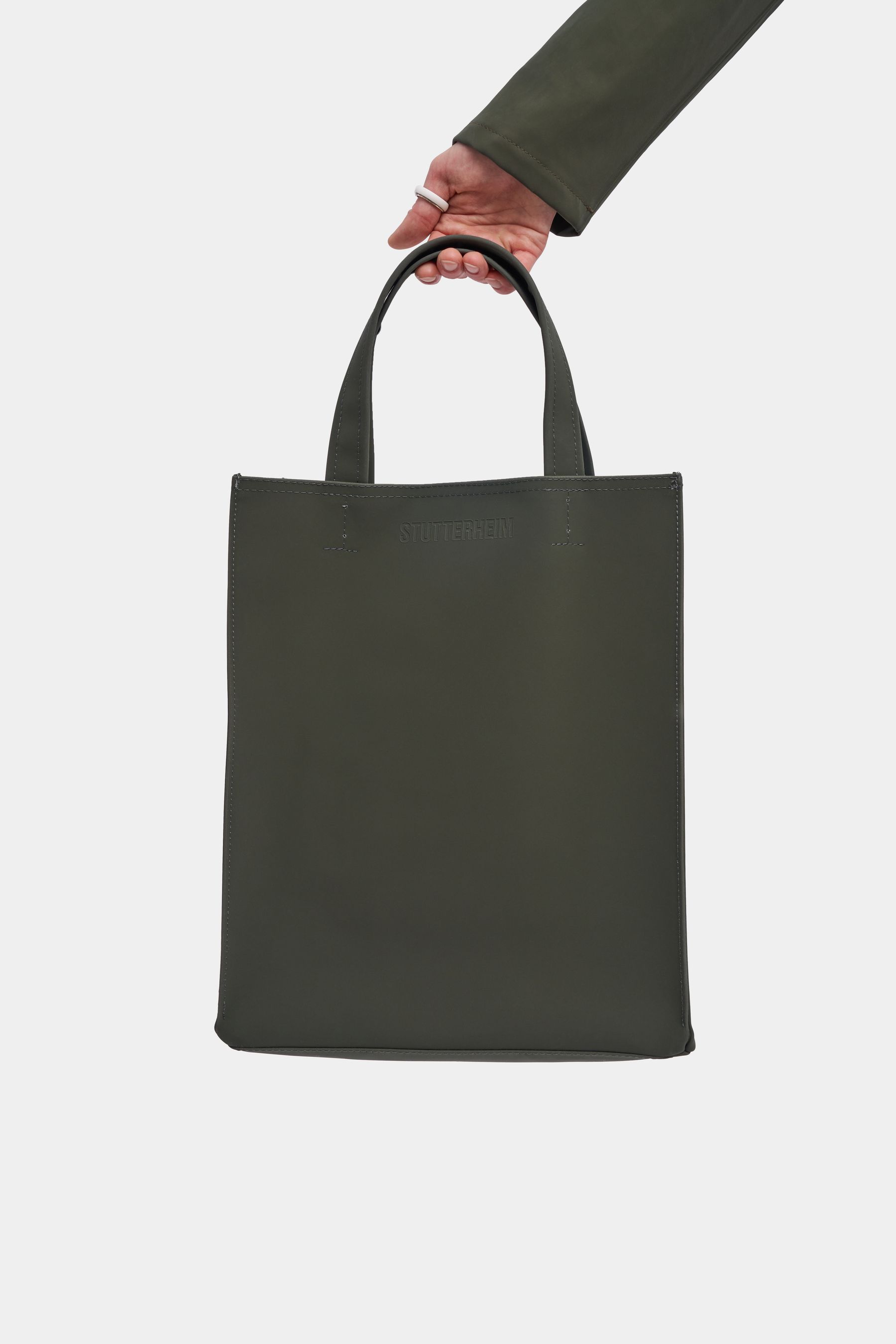 stutterheim stocksund matte bag dark green accessories bags