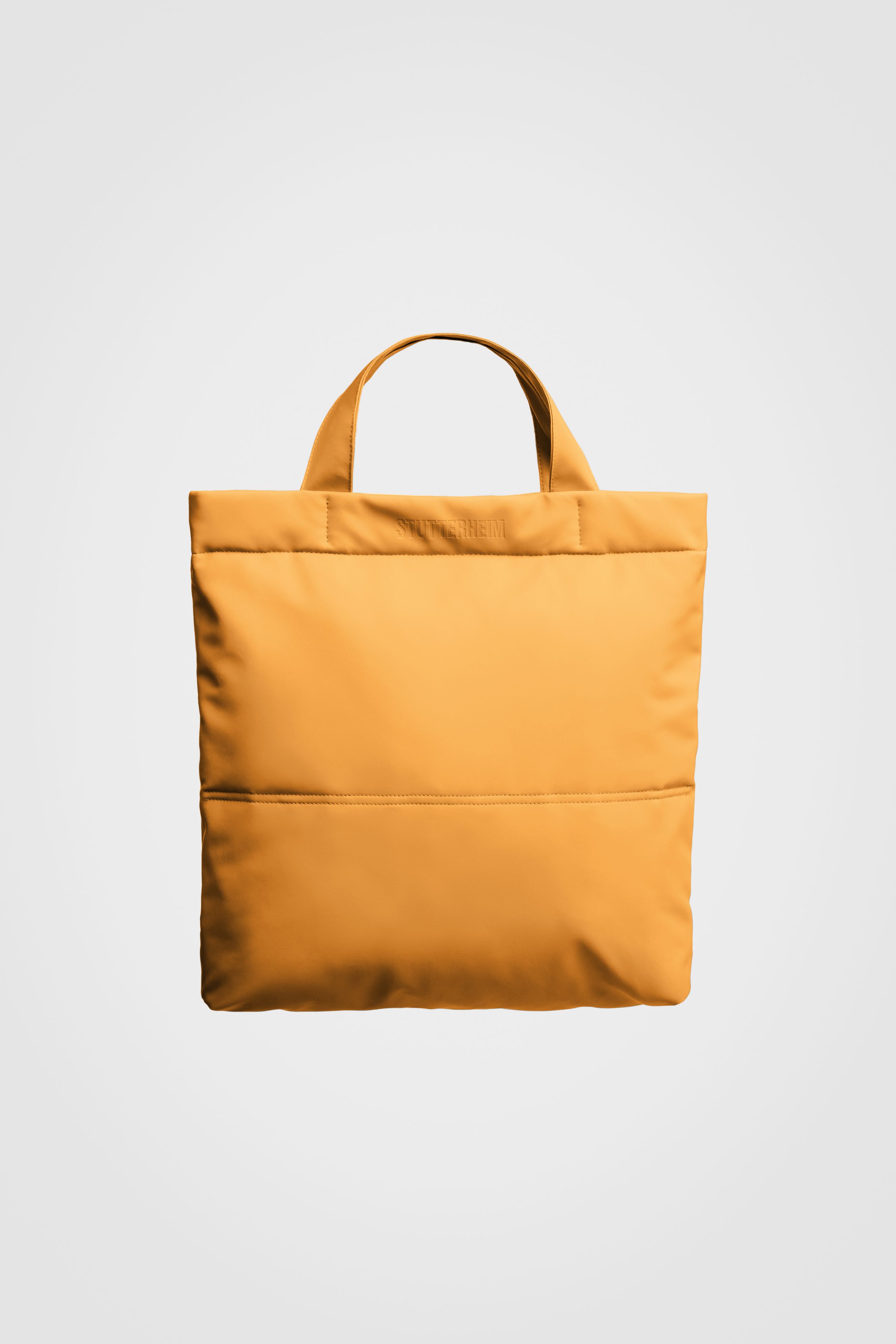 stutterheim upperud puffer brief warm honey accessories bags tote-bags